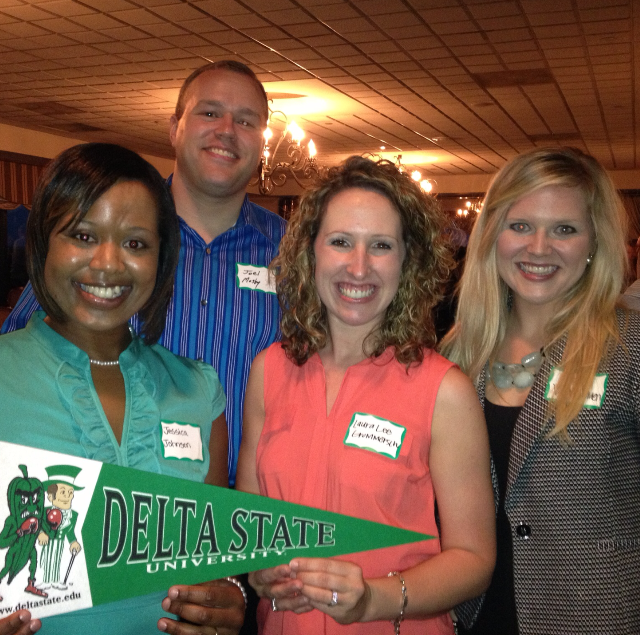 Photo:  The new Memphis Chapter Officers showing some Delta State spirit. L to R:  Jessica Johnson, past president; Joel Mosby, president; Laura Lee Grommersch, vice president; and Kate Kinnison Van Namen, secretary/treasurer.
